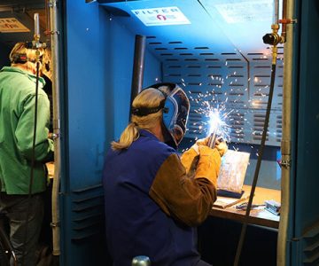 image of students in welding lab