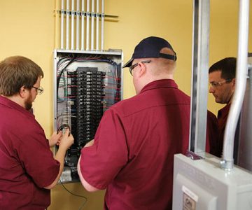 image of students working on exposed wiring