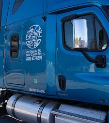 image of blue semi truck with NCST logo on side