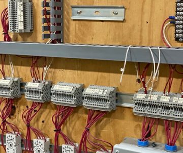 Image of wall covered in electrical wiring