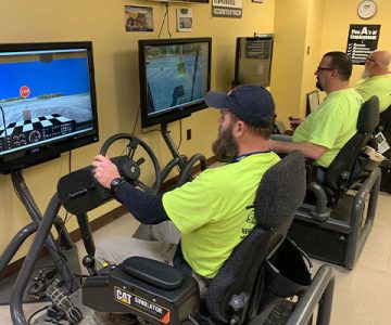 image of students practicing on driving simulator