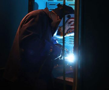 Image of student welding in lab