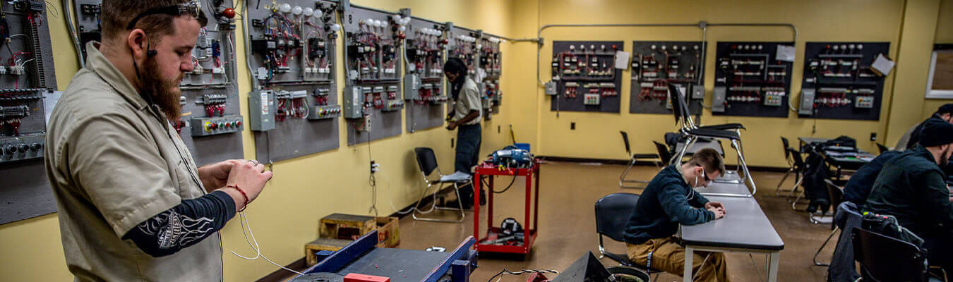 Image of students working in the electrical technology lab