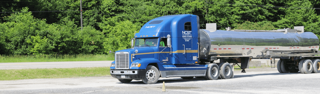 image of blue ncst tanker truck on range