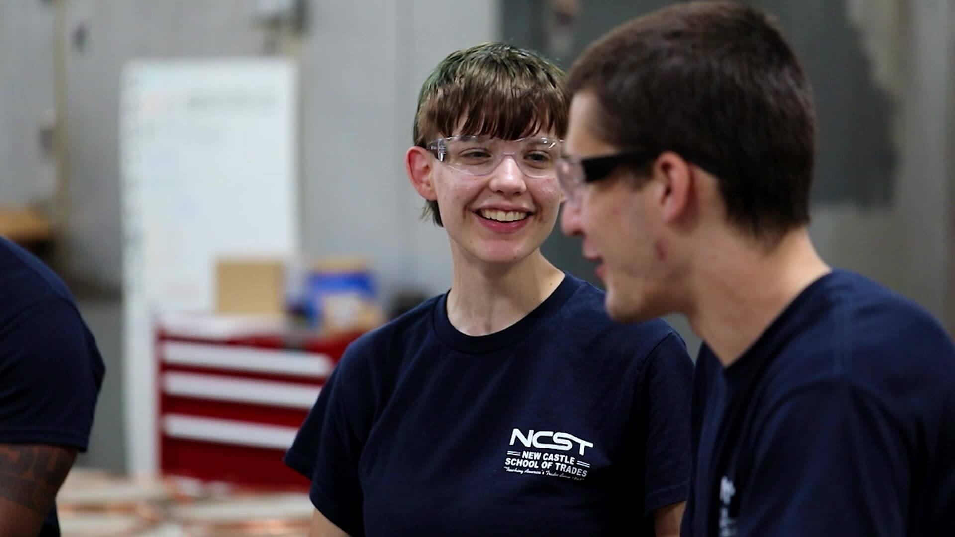 Alexandria laughing with a NCST student