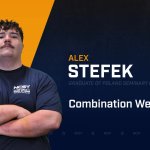 Alex Stefek standing with arms crossed with NCST themed backdrop