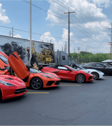 Multiple luxury cars parked in NCST's parking lot