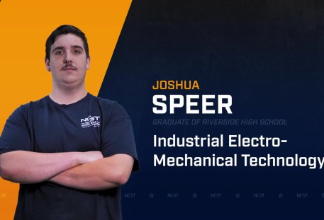 Josh Speer standing with arms crossed with NCST themed backdrop