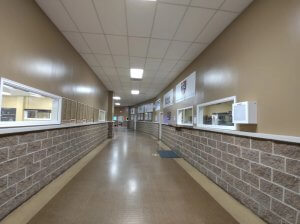 Empty hallway with employer logos on the walls at NCST