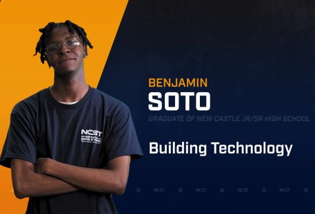 Benjamin Soto standing with arms crossed with NCST themed backdrop
